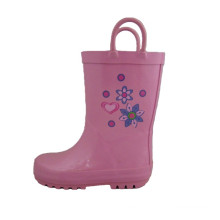 Bottes de pluie en caoutchouc des enfants roses